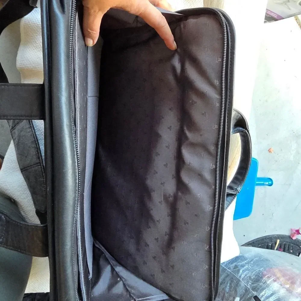 Tumi black leather briefcase